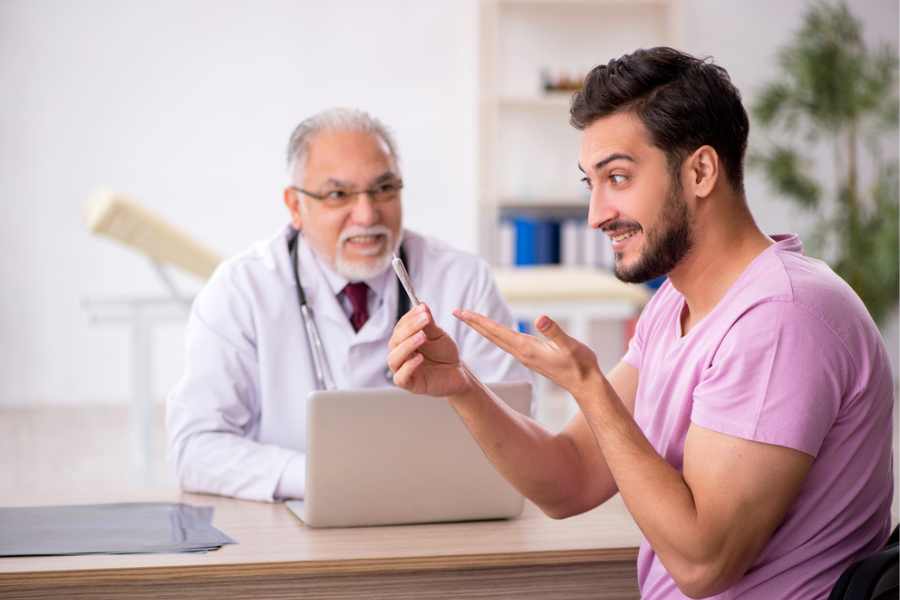 medical marijuana doctor teaching patient how to smoke